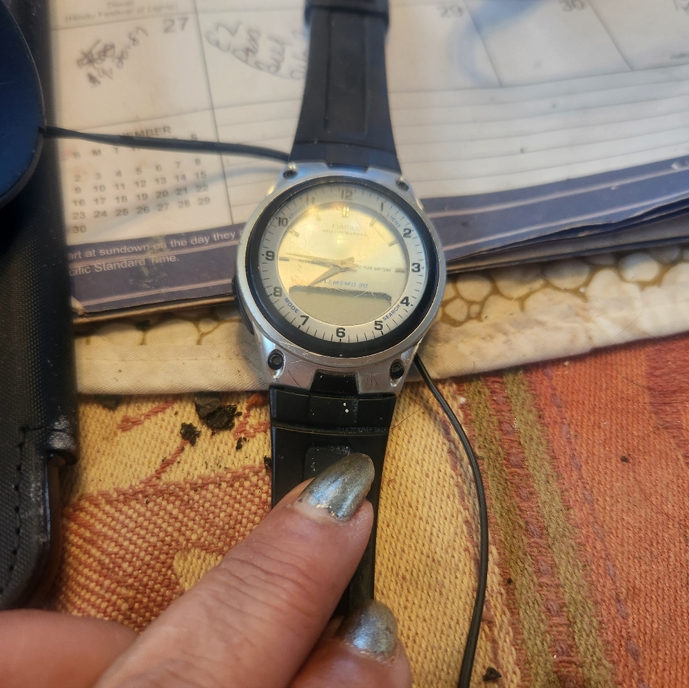 Silver and Black Casio Watch Needs Battery